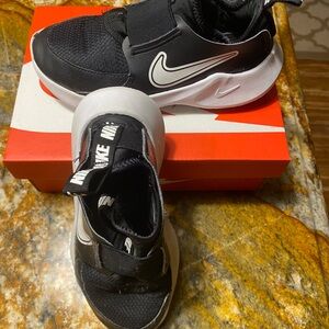 Nike Black and White Slip-On Sneakers